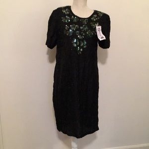 NEW with Tags 100% silk Sequin dress black with green sequin embellishments.